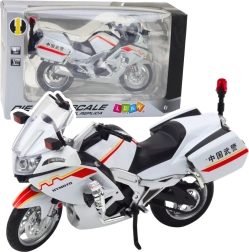 Metallist mootorratas 1:12 tulede ja helidega – valge punase‑kollaste detailidega