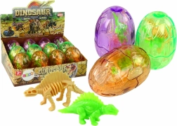 Suur läbipaistev dinosauruse muna 2 figuuriga, 9 cm