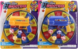 Target with balls and toy gun for kids