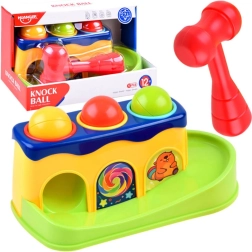 Värviline toksimislaud haamri ja pallidega lastele