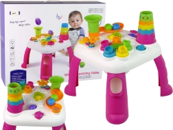 Interactive kids’ educational table with marble run and shape sorter – pink
