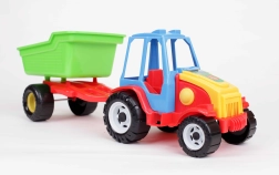 Plastist traktor lastele eemaldatava kallutatava haagisega