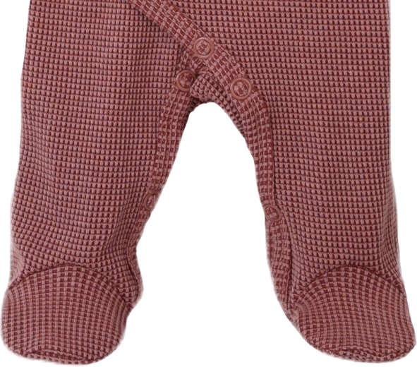 Snap fasteners between the legs for quick diaper changes