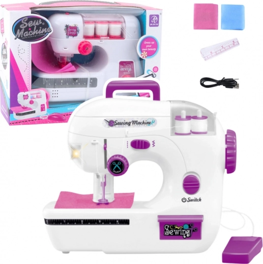 Kids' sewing machine with light and sounds