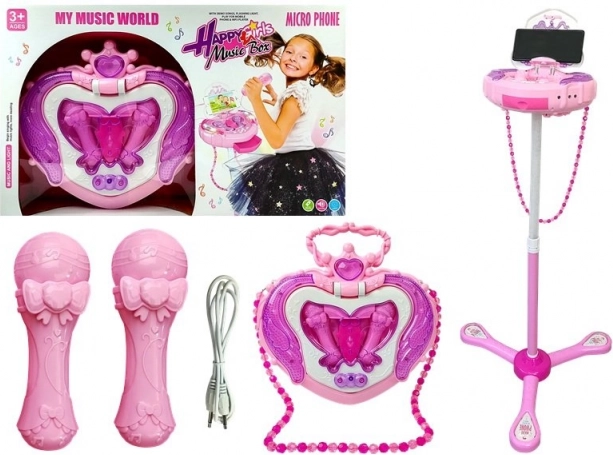 Pink kids' karaoke set with stand, two microphones and heart-shaped jewelry box