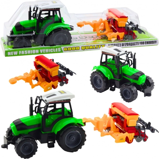 Laste traktor haagisega külvikuga