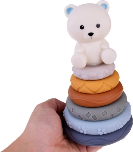 Stacking pyramid with a teddy bear for concentration practice