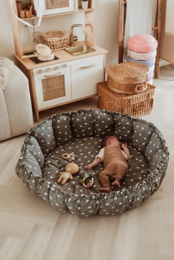 3-in-1: nest, play mat and storage space