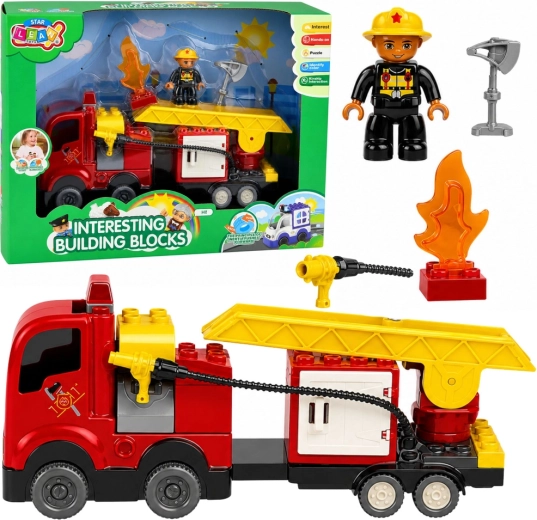 Building set: friction-powered fire truck with ladder and firefighter figure