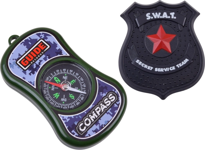 Binoculars, compass and badge for action missions