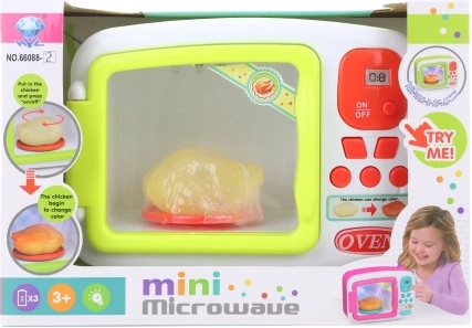 Children's battery-powered microwave with roasted chicken