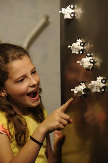 Rides on vertical metal surfaces