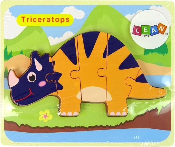 Puidust dinosauruste pusle – tritseeratops või ankülosaurus, oranž