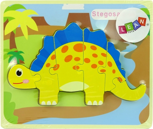 Puidust dinosauruse pusle – kollane stegosaurus või kollane oviraptor