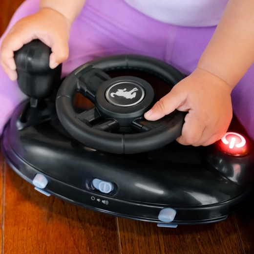 Interactive steering wheel with lights and sounds