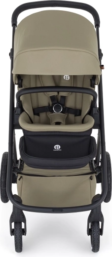 Reversible stroller seat and magnetic harness buckle