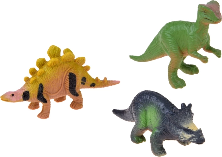 3 dinosaurusefiguuri ja pimedas helendavad kleepsud