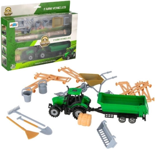 Traktor haagise ja talutarvikutega