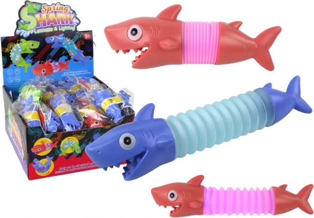 Stressivastane helendav venitatav mänguasi hai Pop Tube LED