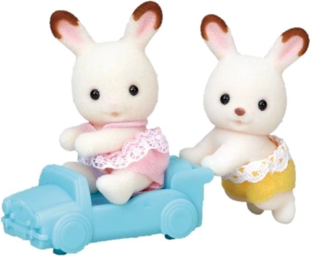 Adorable twins with a soft surface