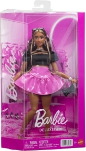 Barbie Deluxe Style doll in a black top and pink skirt