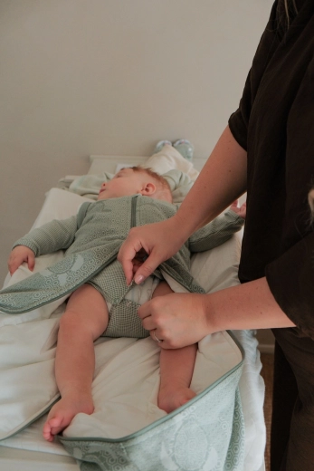 Three-way zipper for quick diaper changes