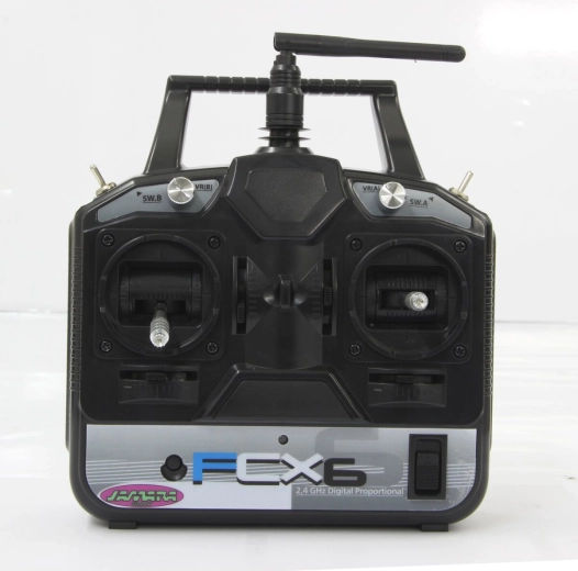 Jamara FCX6 saatja 2,4 GHz, gaas vasakul (B-stock) kotis – 1 tk