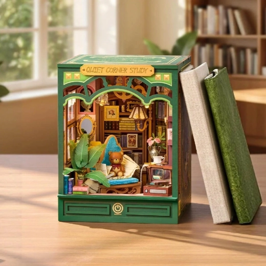 Detailed miniature study room between books