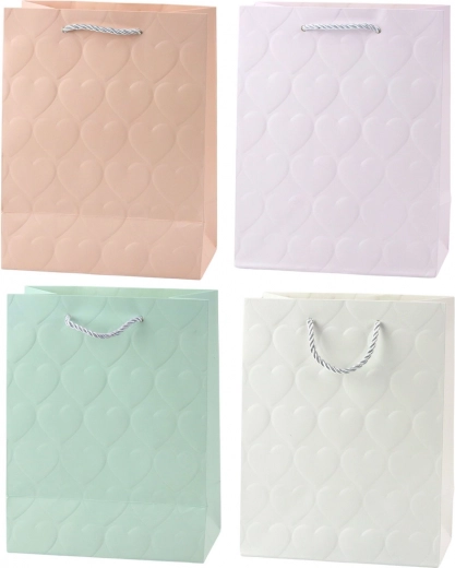 Elegantne kinkekott reljeefsete südametega 23 x 18 x 10,5 cm