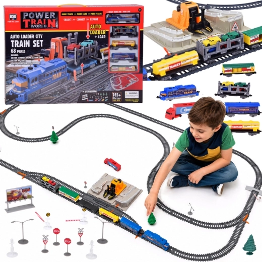 Electric train set with car carrier, 4 toy cars and loading station (762 cm of track)