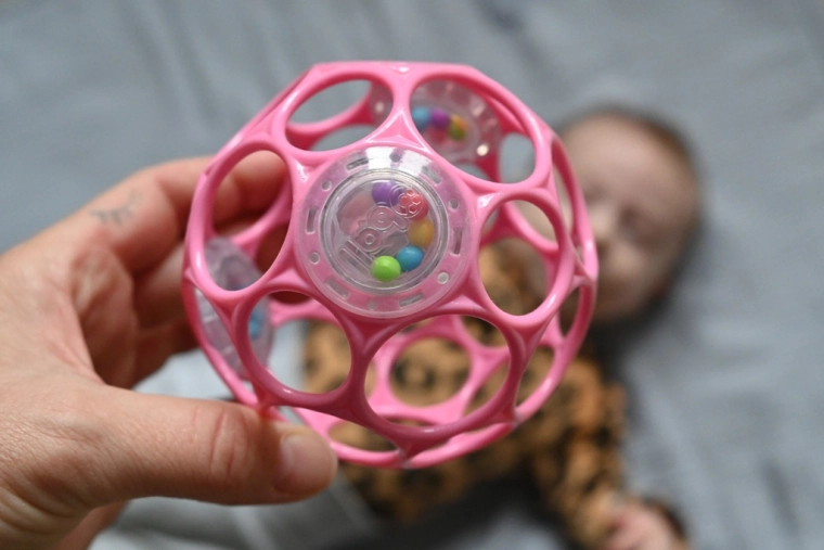 3 rattles with colorful beads