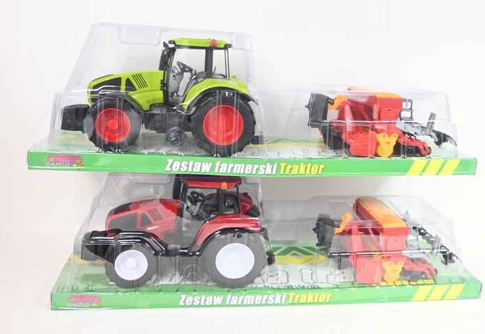 Traktor kinnitatava põllumajandusmasinaga