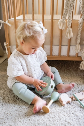Supports motor skills, coordination and a relationship to music