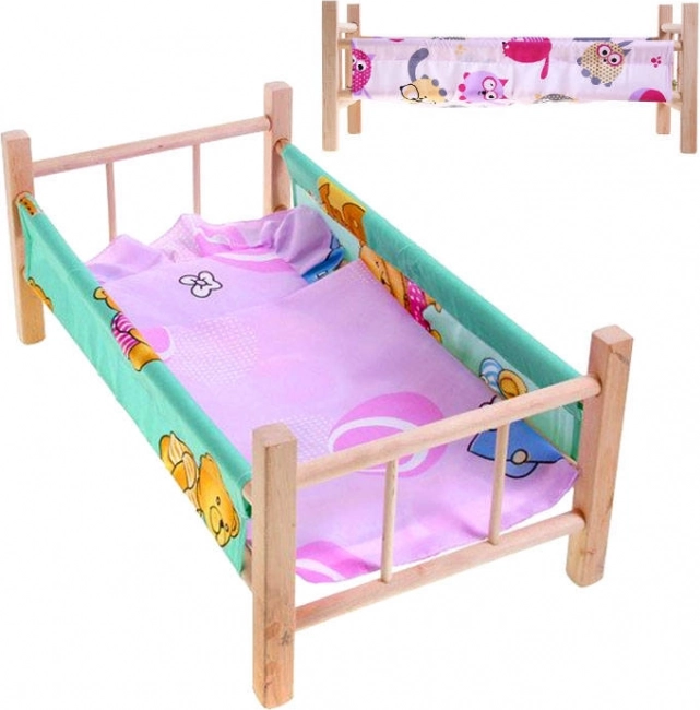 Wooden doll crib with bedding
