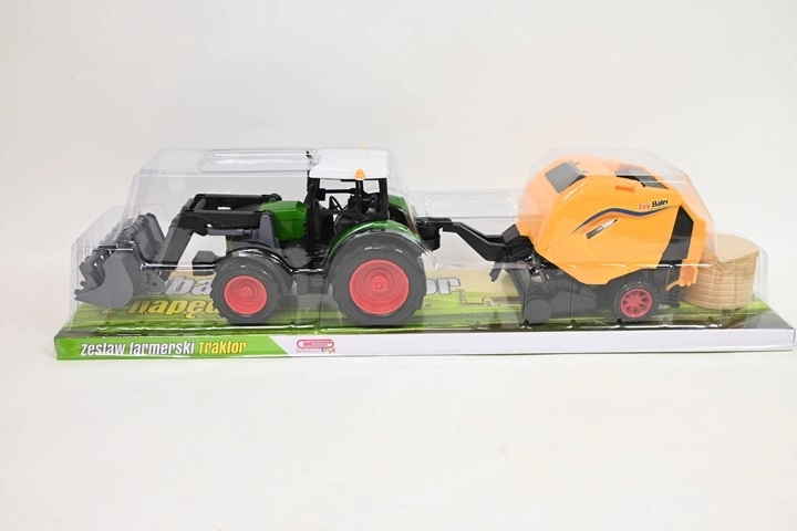 Traktor põllumajandusmasinaga