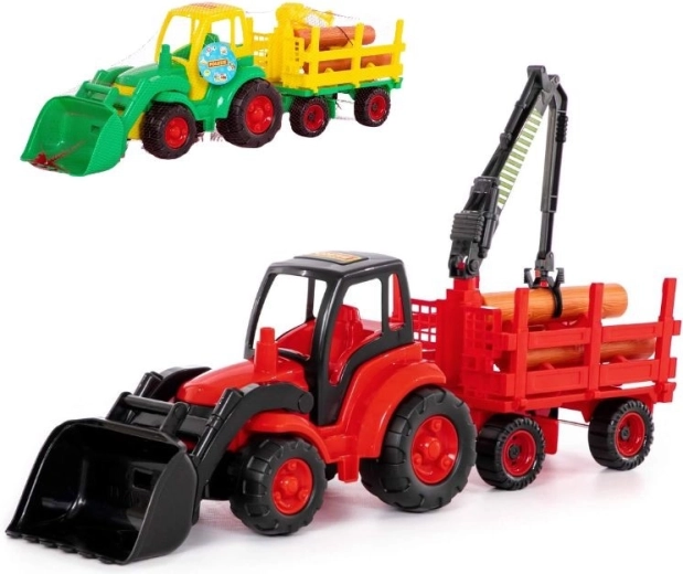 Traktor esilaaduri ja metsaveohaagisega