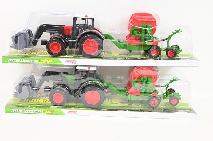 Laste traktor põllutöömasinaga