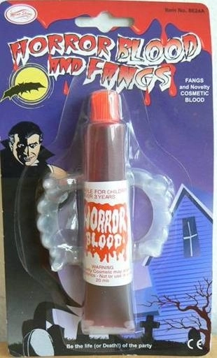 Vampire fangs with fake blood for kids' costumes