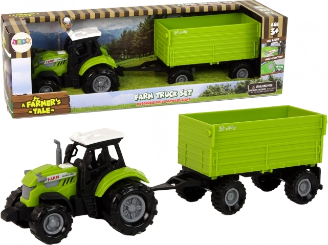 Roheline traktor haagisega, tulede ja helidega