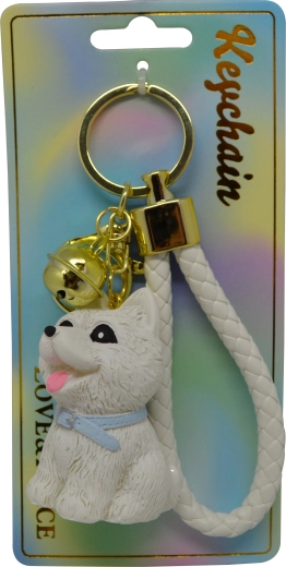Keychain with a sitting white dog