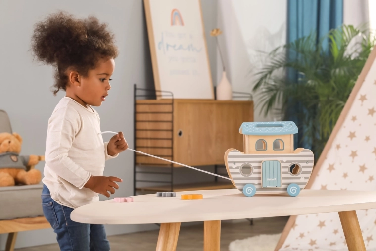 Pull-along toy for gross motor development