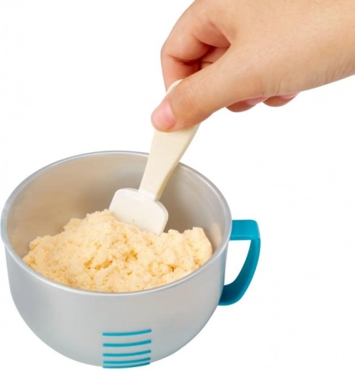 Mõõdutops ja spaatel täpseks segamiseks