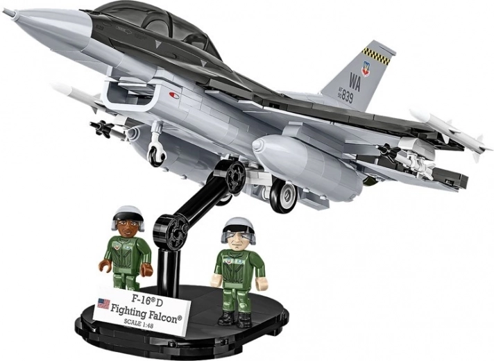 Two minifigures and a display stand