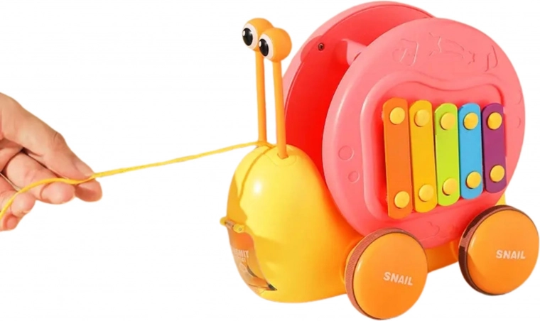 Pull-along snail for motor development