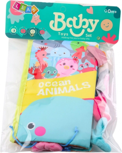 Crinkly pages and a squeaker for sensory fun