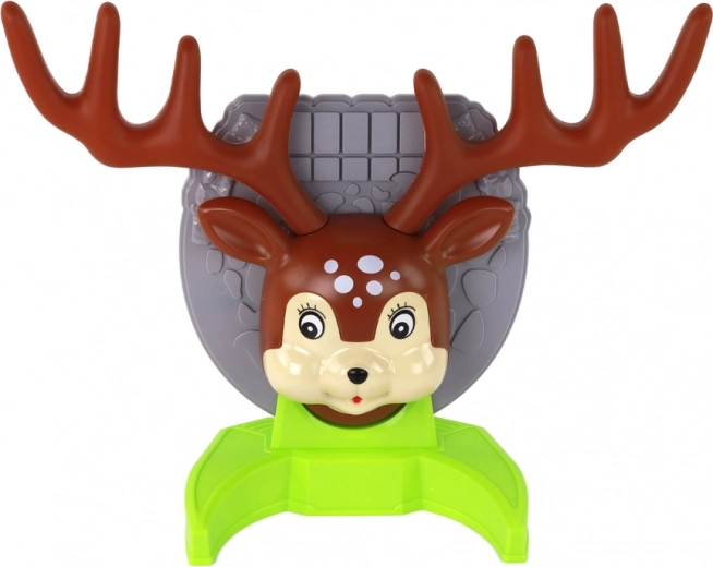 Smiling deer with large antlers