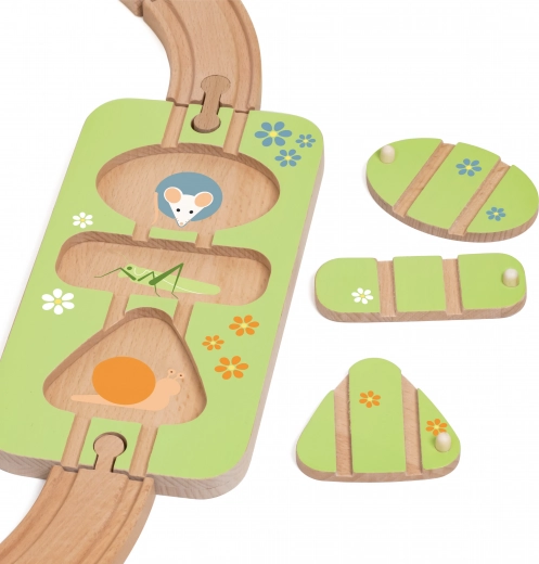 Shape sorter and puzzle in the track