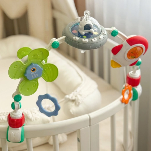Universal mounting to crib, stroller, and car seat