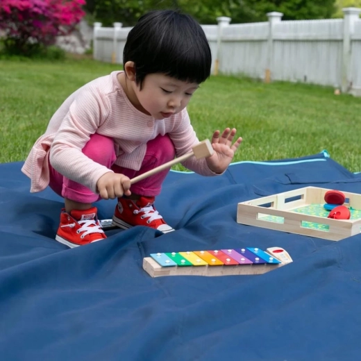 Play that develops rhythm and fine motor skills