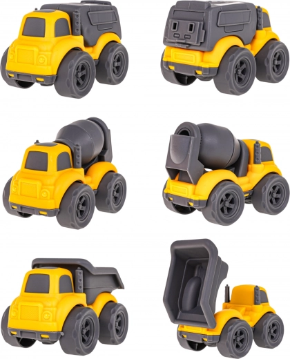 Kolm ehitussõidukit liikuvate osadega